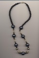Necklace made of plastic and plastic coated glass beads, 1990's, length 24'' 60cm.